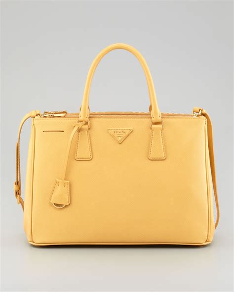 yellow Prada bag